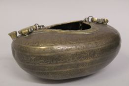 AN ISLAMIC ENGRAVED BRASS KASHKOOL, with chain handle, 26cm wide.