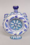 A LATE 19TH CENTURY INDIAN MULTAN POTTERY MOON FLASK, 20cm high.