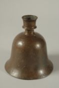 AN 18TH CENTURY MUGHAL INDIAN ENGRAVED BRASS HUQQA BASE, with paisley designs, 16cm high.