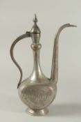 A 19TH CENTURY PERSIAN QAJAR TINNED COPPER EWER.