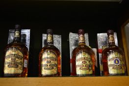 Chivas Regal Scotch whisky, one litre bottle together with three standard bottles, all boxed.