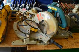 A Makita 110 volt radial arm mitre saw.