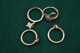 A small group of silver rings.