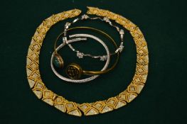 A diamante necklace and three bracelets.