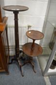 A mahogany tripod jardiniere and a tripod two-tier dumb waiter.