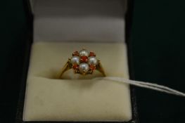 A 9ct gold, coral and pearl ring, size O.