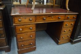 A Victorian mahogany pedestal desk.