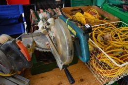 A Makita 110 volt radial arm compound mitre saw.