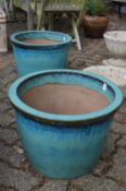 A good large pair of turquoise glazed planters.