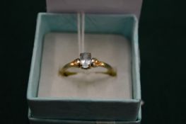 A 9ct gold ring set with a bright blue stone, size P.