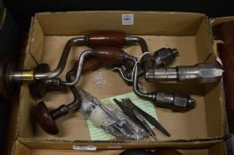 Three vintage wood working braces by J A Chapman together with a collection of bits.