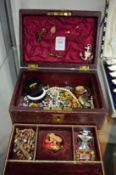 A leather jewel box and contents.