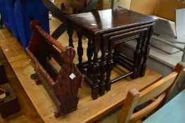A magazine rack and a nest of tables.
