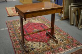 A 19th century rosewood small single drawer occasional table.