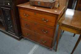 A mahogany three drawer chest.