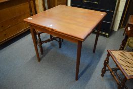 A Danish teak extending table made by Ansager.