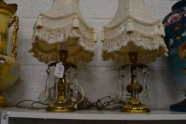 A pair of ormolu candle lustres converted to electricity.