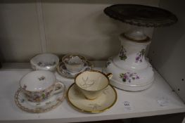 A Dresden cup and saucer and other decorative porcelain.