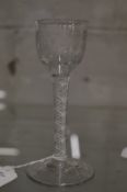 A good Georgian wine glass with opaque twist stem, the bowl engraved with roses.