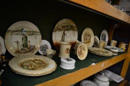 A collection of Dickens related china to include numerous plates, tankards etc.