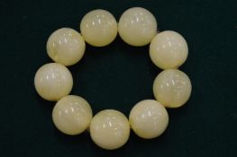 A jade style bead necklace.