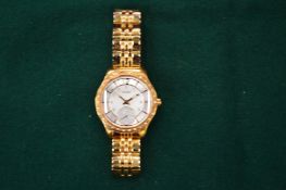 A Guess gilt metal wristwatch.