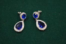 A good pair of silver plated and simulated sapphire and diamond drop earrings.