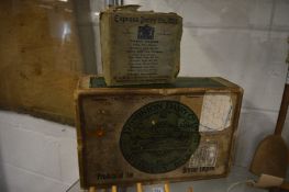 Two old dairy delivery boxes.