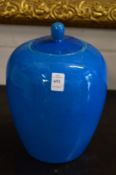 A Chinese blue glazed jar and cover.
