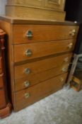 A teak bedroom chest.