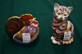 A Crown Derby Imari cat and similar cockerel.