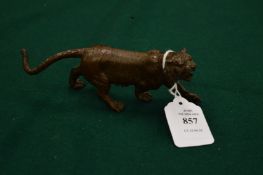 A bronze model of a tiger.