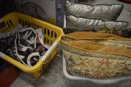 Decorative cushions and two old handbags.