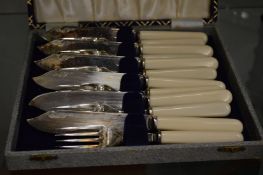 A cased set of six fish knives and forks.