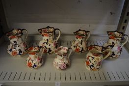 Six Masons Mandalay jugs and a Masons Brocade jug.
