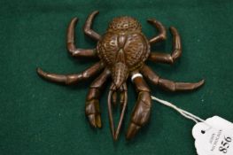 A bronze articulated model of a coconut crab.