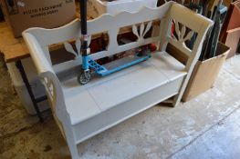 A painted hall bench.