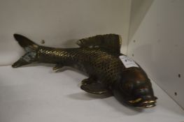 A bronze model of a carp.