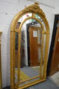 A good large gilt framed arch topped mirror 225cm high x 115cm wide.