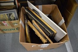 A quantity of paintings and prints.