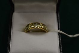 A 9ct gold and cubic zirconia ring.