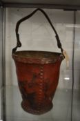 An early leather bucket.