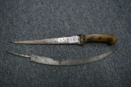 An Eastern dagger and a blade of a dagger.