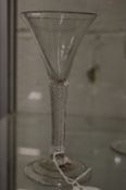 A Georgian wine glass with air twist stem.