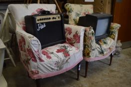 A pair of upholstered chairs.