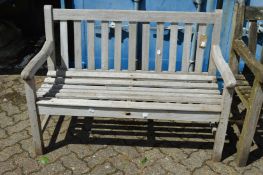 A wooden garden bench.