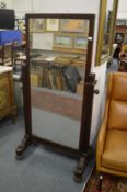 A good 19th century mahogany cheval mirror with original candle sconces.