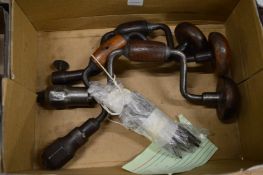 Three small vintage wood working braces and a collection of bits.