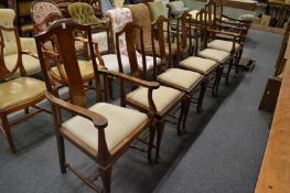A set of six mahogany high back dining chairs, two with arms.