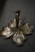 An Art Nouveau pewter figural dish.